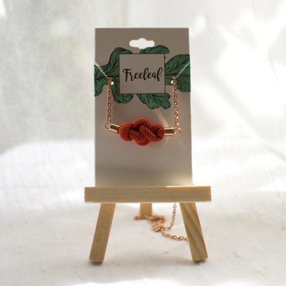 Freeleaf Rose Gold Be Bold Rust Tie Knot Necklace for Courage & Strength - Picture 1 of 6